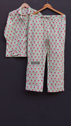 Designed and customized in our India store, the love and care we put into every PJ will stand out to you at the moment you see it. Full sleeve shirt with buttons and loose fit trousers. Completely handmade in Jaipur from 100% pure cotton fabric. Comes in S/M/L/XL sizes, but without any complications can be adjusted to individual measurements. Note: The color and brightness of actual product may vary due to digital photography and photo editing. We crossed check each and every product before list Multicolor Cotton Sleepwear Long Pants, Multicolor Cotton Sleepwear Pants, Matching Cotton Sleepwear, Matching Cotton Sleepwear For Bedtime, Green Cotton Sleepover Sets, Green Cotton Pajama Party Set, Matching Cotton Sleepwear For Pajama Party, Green Matching Sleepwear For Loungewear, Green Printed Sets For Sleepovers