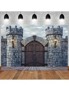 an open door to a castle with stone walls and gates in front of a wooden floor