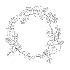 a floral wreath with leaves and flowers on the side, drawn in black ink by hand