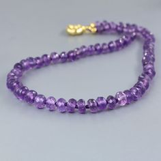 Hand knotted Thread necklace, Gemstone beads necklace, Faceted Amethyst Beaded necklace, Necklace for women, AAA Amethyst, Gold Necklace, 925 Sterling Silver Necklace, Natural Amethyst Necklace, Gift for her. > Gemstone - Amethyst > Quality - AAA Quality > Necklace size - 16 to 26 Inch Available > Beads Size - 4 to 5 MM  > Material - 925 Sterling Silver, Yellow Gold Filled > Shipping Service - Free World Wide Shipping Service > Handmade beaded Necklace. More Jewelry are available related this It Hand-strung Amethyst Necklace For Gifts, Purple Rondelle Gemstone Bead Necklaces, Faceted Amethyst Round Bead Crystal Necklaces, Purple Faceted Round Bead Necklaces, Purple Faceted Bead Necklaces, Purple Rondelle Beaded Necklace With Faceted Beads, Handmade Purple Rondelle Necklaces, Amethyst Rondelle Necklace With Faceted Beads, Hand-strung Purple Necklace As A Gift