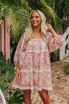 - Embrace the boho spirit with this dreamy dress! - Lined material with an abstract floral print featuring reds and pinks - An elastic scoop neckline - Loose ¾ length sleeves with drawstring closure cuffs featuring tassel accents - Crochet detail - Hidden side pockets - A flowy silhouette that ends in a mini dress length hemline Abstract Floral Print, Dreamy Dress, Crochet Details, Floral Mini Dress, Abstract Floral, Scoop Neckline, Bohemian Style, Dress Length, Length Sleeve