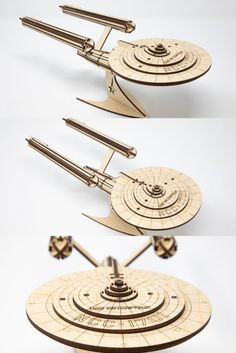 three different views of a wooden model of a star trek ship