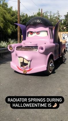 the character from cars is driving down the street