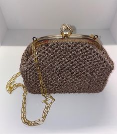 Handmade Crochet Bag with Silver Metal Chain Strap and clasp Colour: Beige Dimensions:  Bag: 22 x 11 x 18cm (height) / 8.7 x 4.3 x 7 in Chain Strap: 100cm Can be used with or without the chain Inside the bag there is a zip pocket  Worldwide tracked delivery Elegant Crochet Clutch For Formal Occasions, Elegant Formal Crochet Clutch Bag, Elegant Crochet Clutch Bag, Chic Formal Crochet Rectangular Bag, Brown Rectangular Crochet Bag For Party, Formal Rectangular Crochet Bag, Elegant Crochet Rectangular Evening Bag, Brown Rectangular Crochet Party Bag, Elegant Rectangular Crochet Evening Bag