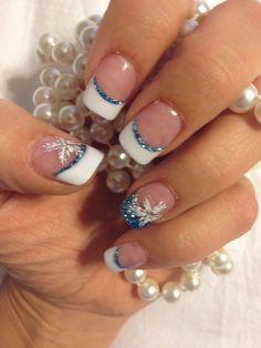 Christmas Ball Nails Design, New Year Nails 2025 Blue, Holiday French Nails Christmas, Christmas And Winter Nails, Snowflake Fingernails, Blue French Tips With Snowflakes, Christmas Nail Tip Designs, Xmas French Nails, Short Blue Christmas Nails