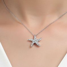 Fun and stylish. This starfish necklace is set with 1.01 carats total weight of Lafonn's signature Lassaire simulated diamonds in sterling silver bonded with platinum. The pendant comes on an adjustable 20" chain. Pendant measures approximately 0.75 inches from top to bottom and just over a 0.75 inches wide at widest point Includes pendant box Ships fully insured to point of delivery Elegant Starfish Necklace For Gift, Elegant Starfish Charm Pendant Jewelry, Elegant Jewelry With Starfish Charm, Elegant Star-shaped Jewelry With Starfish Charm, Elegant Starfish Charm Jewelry As Gift, Elegant Starfish Charm Jewelry For Gifts, Elegant Starfish Charm Jewelry Gift, Elegant Pendant With Starfish Charm, Elegant Silver Starfish Jewelry