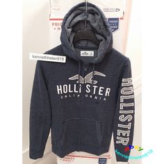 NEW HOLLISTER MENS LOGO GRAPHIC FULL ZIP HOODIE SWEATSHIRTS LIGHT NAVY SMALL NEW WITH TAG 100% Authentic Guarantee  Details A soft fleece sweatshirt featuring a hood with drawstrings, full-zip closure, logo graphic print, pouch pockets and ribbed trim Imported Material and Care 60% Cotton, 40% Polyester Machine wash cold, with like colors Only non-chlorine bleach Tumble dry low Low iron if needed Do not dry clean DUDES TOPS HOLLISTER CHEST (IN) ARM (IN) CHEST (CM) ARM (CM) KOREA CHINA XS 34 - 36 32 86 - 91 81 90 165/84A S 36 - 38 32.5 - 33.5 91 - 96 82 - 85 95 170/92A M 38 - 40 34 - 34.5 96 - 101 86 - 87 100 175/96A L 40 - 42 34.5 - 35.5 101 - 107 89 - 90 105 180/104A XL 43 - 45 35 - 35.5 109 - 114 89 - 90 110 185/108A XXL 46 - 48 35.5 - 36 117 - 122 90 - 91 115 190/116A Winter Blue Sweatshirt With Logo, Winter Blue Logo Sweatshirt, Blue Logo Hoodie For Streetwear, Blue Sporty Hoodie With Logo, Blue Hooded Hoodie With Logo, Blue Hooded Sweatshirt With Logo, Blue Winter Tops With Logo, Casual Cotton Outerwear With Logo, Navy Hooded Hoodie With Logo Print