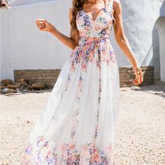 Brand New. Never Worn. Beautiful Chiffon Floral Maxi Dress Size Medium Bust:36.3-37.3in Waist:28.0-29.0in Hip:39.2-40.2in White V-neck Maxi Dress For Spring, White Chiffon V-neck Maxi Dress, White Floral Print V-neck Maxi Dress, White V-neck Maxi Dress With Floral Print, White V-neck Maxi Dress For Garden Party, Feminine White Maxi Dress For Summer, White Chiffon Maxi Dress For Summer, White Maxi Dress For Spring And Summer, White Chiffon Maxi Dress Feminine Style