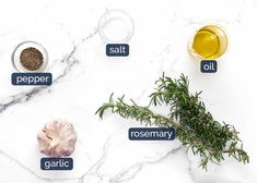 herbs and salt on a marble countertop with the words salt, pepper, rosemary