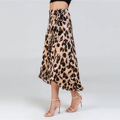 Gender: Women Waistline: Natural Model Number: skirt180730401 Material: Polyester Silhouette: Asymmetrical Dresses Length: Mid-Calf Pattern Type: Leopard Decoration: NONE Style: Casual Fabric : Fabric has no stretch Color: coffee UID: 180823237 Style: Casual Silhouette: Shift Season: Summer Waist Type: Mid Waist Material: 100% Polyester Length: Mid-Calf Occasion: Weekend Casual Decoration: Knot Pattern Type: Leopard Asymmetrical Dresses, Knot Pattern, Natural Models, Leopard Print Skirt, Wedges Sandals, Asymmetrical Design, Print Skirt, Asymmetrical Dress, Cropped Top