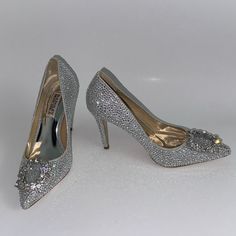 Add A Touch Of Elegance To Your Wardrobe With These Badgley Mischka Cher Ii Pointed Toe Pump Heels. These Ivory Colored Pumps Are Adorned With Rhinestones, Giving Them A Glamorous Look. The Textile Upper, Synthetic And Textile Lining, And Leather Sole Make Them Comfortable To Wear For Any Occasion. These Size 5.5 & 6 Women's Shoes Have A Standard Shoe Width And Are Perfect For Any Formal Event. The Brand, Badgley Mischka, Is Well-Known For Their Luxurious Designs. These Pumps Are Perfect For Completing Any Outfit With A Touch Of Class And Sparkle. New Without Box Retail Price : $265 Guaranteed 100% Authentic Heels Rhinestone, Pump Heels, Badgley Mischka Shoes, Badgley Mischka, Ivory Color, Formal Event, Pumps Heels, Women's Shoes Sandals, Women's Shoes