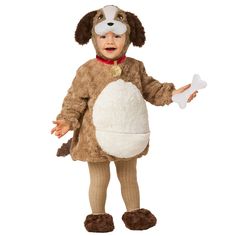 a little boy dressed in a dog costume