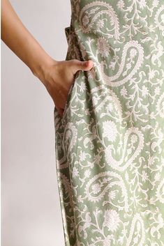 The Alicia shirt midi dress is a springtime staple. Crafted with care from cotton, its charming block print adds flair to its warm green shade. Featuring a collared design and front button closure, this jade short-sleeve maxi dress exudes casual elegance. With two handy pockets, it's as practical as it is stylish, making it perfect for effortless chic on sunny days.Material: Cambric - 100% cottonStyle/Print: Hand Block PrintNumber of Pockets: 2Length: 45 inchesOccasion: CasualColor: Jade Cotton Knee-length Maxi Dress For Daywear, Fitted Modest Cotton Maxi Dress, Light Green Casual Maxi Dress For Spring, Casual Light Green Maxi Dress For Spring, Light Green Maxi Dress For Spring, Casual Light Green Cotton Dress, Cotton Short Sleeve Maxi Dress For Daywear, Modest Maxi Cotton Dress, Modest Maxi Length Cotton Dress