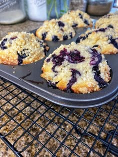 blueberry muffins cooling on a wire rack