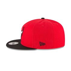 The Chicago Bulls Two Tone 9FIFTY Snapback features an embroidered Bulls logo at the front panels with a team color NBA logo above the snapback closure at the rear. Snapback Hat With Team Logo For Fans, Fan Merchandise Snapback Hat With Team Logo, Flat Bill Snapback Hat With Team Logo, Sporty Hat With Flat Brim For Fan Merchandise, Casual Hats With Logo Patch And Flat Crown, Casual Hat With Logo Patch And Flat Crown, Casual Flat Crown Hats With Logo Patch, Red Snapback Hat With Logo Patch For Streetwear, Casual Baseball Cap With Embroidered Logo And Flat Crown