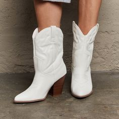 With Their Mid-Shin Height And Striking Design, These Legend Footwear Bella Cowboy Boots Are More Than Just Footwear; They're A Statement Piece That'll Turn Heads And Elevate Your Style Game, Whether You're Two-Stepping At The Rodeo Or Adding Flair To Your Everyday Ensemble. Details Type: Booties Color: White Toe: Point Toe Heel Height: 3.5 In Heel Shape: Block Heels Materials Upper: Pu Lining/Insole: Pu Outsole: Rubber Don't Hesitate To Make An Offer. Bundle Your Favorites And Save On Shipping. Western Style White Ankle Boots, White Closed Toe Winter Boots, White High-top Boots For Outdoor, White Fitted Ankle Boots, Fitted White Ankle Boots, White Ankle-high Summer Boots, White Boots With Reinforced Heel For Spring, White Closed Toe Outdoor Boots, White Closed Toe Boots For Outdoor