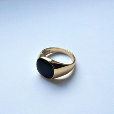 The Ring for Daily wear. Made from stainless steel & Black Enamel, this ring will continue to last. Combine with our Black & Gold Onyx necklace for the Set! DETAILS  Hypoallergenic | No Tarnishing | No Fading | No Irritation Materials: Made from Recycled Stainless Steel / 18K Gold PVD Plating Included in our Lifetime Warranty Packed in a Twistedpendant Jewellery Pouch SIZE DETAILS This ring is available in US sizes 6-12. All the measurements are detailed in our size chart. Sizes 6-7 = XS / S | S Black Onyx Ring Gold, Mens Ring Gold, Pinky Ring Gold, 80s Jewelry, Mens Pinky Ring, Mens Gold Rings, Gothic Rings, Ringe Gold, Black Ring