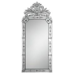 an ornate mirror is shown against a white background