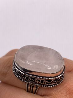 Vintage rose quartz Ring  Silver white bronze  NOT 925  Very detailed  Size 7 My jeweler can re size it for a $20 fee.  Ships free in the US in a nice gift box  Please check out our THOUSANDS of great feedback reviews Rose Quartz Crystal Ring Gift, Silver Rectangular Moonstone Ring Gift, Rectangular Silver Moonstone Ring Gift, Silver Rose Quartz Crystal Ring Gift, Rose Quartz Ring, Rose Vintage, Quartz Rose, Quartz Ring, Vintage Rose