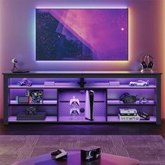 a living room with purple lighting and a large painting on the wall above the entertainment center