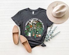 OxbridgeCo Plant Shirt, Plant TShirt, Botanical Shirt, Plant Lover Shirt, Funny Plant Shirt, Gardening Shirt, All I Need Is Coffee And Plants Shirt This customized gift can be used by all the members of family, it will be the best wanderlust, travel apparel unisex personalized shirt ever! 👉 Product Details:The T-Shirts, Hoodies, Youth, Toddler and Baby Suits(onesie) are unisex.👈 👉Reading the Sizing Chart: Please note that the sizing chart includes the measurements of one side of the shirt, no Plant Tshirt, Botanical Relax Fit T-shirt With Plant Print, Green T-shirt With Plants Print, Relaxed Fit, Relaxed Fit T-shirt With Plants Print, Botanical Plants Print Relaxed Fit T-shirt, Green Plants Print T-shirt For Gardening, Botanical Shirt, Gardening Shirts, Vinyl Colors