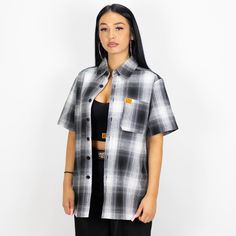 Introducing the Short Sleeve Checker Flannel Shirt! Our lightweight cotton/poly blend is extremely comfortable and provides breathability! This shirt is for both men and women Cotton/Polyester blend Manufactured by FB County Breathable fabric Model is 5'9" and is wearing size XL Fb County, Short Sleeve Flannel, Checkered Shirt, Blue White And Black, Flannel Shirt, Animation Art, Grey And White, Breathable Fabric, Brown And Grey