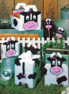 the cover of an old knitting book shows farm animals in their crocheted clothes