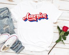 Distressed America Shirt - Unisex T Shirt, Women Racerback Tank, Long Sleeve T-Shirt Tees Tshirt Sweatshirt Sweater Hoodie Gift For Men Women Boys Girls Well, let's say goodbye to all this boring apparel... The GodBlessThisDesign team creates custom clothes with great designs to suit all tastes. Our unique and blessed designs are a blast fit for every occasion and always a perfect fit... We combine our beautiful designs with high quality apparel like no one has ever done before. There's nothing worse than being charmed by a nice design and then finding that the apparel with that design looks like an old cheap and mediocre quality apparel. All right, then ... we got you covered. You are absolutely going to love our dynamic duo of comfortable AND cute apparel. A B O U T - T H I S - A P P A R Freedom Shirts, Fourth Of July Shirts, T Shirt Women, Shirt Women, Family Shirts, Fourth Of July, Memorial Day, Racerback Tank, Custom Clothes