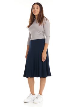 The Navy Blue Florence A-line skirt is a simple yet stylish, and flattering, below knee length panel skirt. It is made of a soft, stretchy fabric that is lightweight, comfortable and has fabulous flare. A nice fabric to dress up for the holidays, or dress down for work. Modest / Tznius A-line flary modest skirt Pull-on closure No pockets No slits Below knee-length Skirt length: Sizes XS-S: 24" M-L: 25" XL: 25.5" 1X-3X: 26" Machine wash cold inside out, hang/line to dry Slim models range from 5'5 Stretch A-line Skirt For Work, Fitted A-line Maxi Skirt With Gathered Detail, Stretch A-line Gathered Skirt Bottoms, Flattering Fitted Midi-length Skirt, Fitted A-line Elastane Bottoms, Fitted A-line Elastane Skirt, Stretch A-line Skirt With Lining, Blue Fitted A-line Maxi Skirt, Fitted Elastane Flared Maxi Skirt