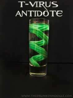 there is a tall glass with green liquid in it and the words t - vrus antidote