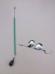 three mirrors are attached to a fishing hook