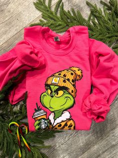 This sweatshirt is DTF transfer on a bright pink fleece sweatshirt or tshirt!! Super soft inside the sweatshirt! great fit! True to size! 50/50 cotton poly Unisex sizing. Check out my entire boutique at www.LureBoutiqueClothing.com **I may use different brands depending on stock of sweatshirts Holiday items are final sale! Grinch Bleached Sweatshirt, Nike Grinch Sweatshirt, Pink Christmas Sweatshirt, Hot Pink Christmas Sweatshirt, Disney Christmas Sweatshirts & Hoodies, Santa Sweatshirt, Holiday Sweatshirt, Vintage Santas, Christmas Sweatshirts