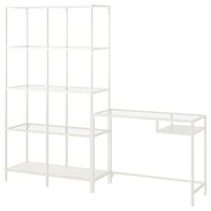 two white shelves sitting next to each other