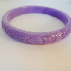 Beautiful Genuine Jade Bangle With Carvings All Around Bracelet Elegant Adjustable Lavender Bracelet, Elegant Lavender Adjustable Bracelets, Handmade Lavender Bracelets, Elegant Carved Adjustable Bracelet, Elegant Adjustable Carved Bracelet, Adjustable Purple Bracelets For Formal Occasions, Elegant Carved Bracelet, Formal Adjustable Purple Bracelets, Handmade Purple Round Bangle