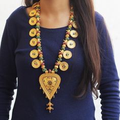 This Necklace is fully handmade. It is made with thread, brass & beads. It is a long traditional necklace. Its length is adjustable from 20 inches to 26 inches long. It can be worn for any occasion/celebration. Traditional Beaded Necklaces For Festival Gift, Handmade Necklaces For Ceremonial Festivals, Handmade Ceremonial Necklaces For Festivals, Handmade Ceremonial Necklace For Festivals, Traditional Handmade Long Beaded Necklace, Traditional Handmade Gold Long Necklace, Handmade Beaded Necklaces For Rituals And Festivals, Handmade Gold Long Bridal Necklace, Gold Long Necklace For Festivals