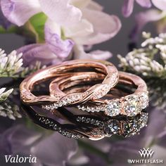 0.328ct I VS1 A CUT ABOVE Round Diamond set in Valoria Flora Twist Three Stone Diamond Engagement Set