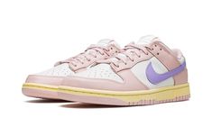 The Women’s Nike Dunk Low “Pink Oxford” is a women’s-exclusive colorway of the retro basketball shoe with a spring-ready vibe.  The “Pink Oxford” features a combination of pastel colors on its design, beginning with its Pink Oxford leather overlays.  A Light Thistle-colored Swoosh appears on the sides of the shoe.  The same lavender-colored purple hue can be found on the “Nike” branding stitched onto the heel.  Additional Pink Oxford accenting comes into play on the “Nike” and Swoosh logos on th Dunk Low Pink Oxford, Low Dunk Nike, Pink Oxford Shoes, Womens Dunk Low, Retro Basketball Shoes, Oxford White, Dunks Nike, Nike Brand, Pink Nikes