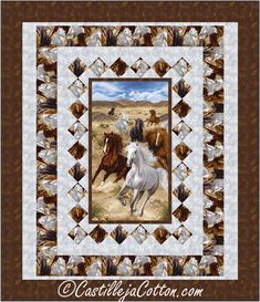 a quilt with horses running in the desert