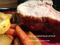 meat, carrots and potatoes on a plate with a red table cloth in the background