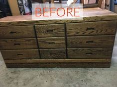 a large wooden dresser sitting inside of a room