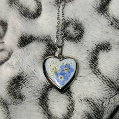 Handmade Pressed Flower Forget Me Not Heart Necklace - Etsy White Heart-shaped Jewelry With Pressed Flowers, White Heart Jewelry With Pressed Flowers, Heart-shaped Pressed Flowers Jewelry For Keepsake, Silver Locket Necklace With Flower Charm As Gift, Delicate Silver Locket Necklace Gift, Silver Delicate Locket Necklace Gift, Silver Locket Necklace With Birth Flower Gift, Silver Birth Flower Locket Necklace For Mother's Day, Silver Locket Necklace With Birth Flower For Mother's Day