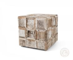 the cube stool is made out of several different types of furs and leather material