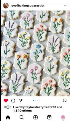 cookies decorated with flowers and leaves are on the instagramture for an upcoming post