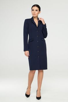 "This blazer dress would be perfect for the office or any other event that requires a more business casual dress code. - Button front fitted jacket dress - Lapel collar - Knee length (midi) - Long sleeves - With black metal buttons - Fully lined - Color: navy blue Fiber: 60% viscose, 35% polyester, 5 % elastane, lining - 95 % viscose, 5% elastane. Estimated shipping time: 10-12 business days For size S:dress length- 40,0 \" (102 cm), sleeve length 24\" (61 cm) Our model wears size S (US 6) and i Single Breasted Fitted Skirt Suit For Business Casual, Fitted Single Breasted Skirt Suit For Business Casual, Fitted Single-breasted Skirt Suit For Business Casual, Tailored Professional Blazer Dress For Formal Occasions, Tailored Professional Blazer Dress For Formal Events, Professional Single Breasted Skirt Suit, Professional Single Breasted Skirt Suit For Office, Elegant Single-breasted Blazer For Office, Professional Single-breasted Skirt Suit For Office