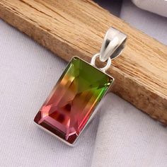 Watermelon Tourmaline Quartz Pendant, Colorful Gemstone Pendant 925 Sterling Silver Handmade Rectangle Bar Promise Pendant, Gift For Women  Material: 925 Sterling Silver  Gemstone: Watermelon Tourmaline  Gem Shape: Rectangle Gem  Color: Multicolor   Style: Bohemian Tourmaline is a gemstone of incredible diverse color and hue found in glittering earrings and necklaces. All types of tourmaline offer healing and protection, and specific colors are imbued with their own special properties. Green and Rectangular Rainbow Jewelry For Gifts, Tourmaline Quartz, Tourmaline Pendant, Women Pendant, Glitter Earrings, Tourmaline Stone, Wound Healing, Jewelry Simple, Watermelon Tourmaline