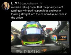 a person in a racing car wearing a helmet and looking at the camera with an instagram