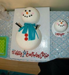 a birthday cake with a snowman on it