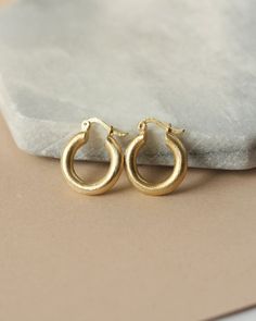 These chunky hoops are made of raw brass that's been given a brushed texture for a gorgeous golden shine. The hoops are made of hollow wire so the hoops are nice and comfortable to wear. The hoops are 16mm wide and the wire is 3mm thick - the thicker size gives the hoops a modern look that's sure to get noticed. The ho Brass Hoops, Raw Brass, Brass