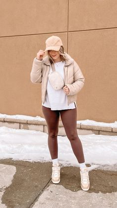 Shop here: https://liketk.it/404k1 Winter Outfits Puffer Jacket, Puffer Jacket Brown, Winter Ootd, Ootd Winter, Brown Leggings, Wedge Sneakers