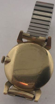 THIS BEAUTIFUL LORD ELGIN WATCH DATES BACK FROM 1951-1952 BASED ON SERIAL NUMBER BEFORE THIS WATCHES STARTED BEING MANUFACTURED IN SWITZERLAND MOVEMENT IS A 21 JEWELL USA MADE 14K GOLD FILLED CASE MADE BY SCHWAB AND WUISCHPARD OF NY FAMOUS FOR MAKING CASES FOR HIGH END WATCHES SUCH AS LONGINES, WITTNAUER AND HAMILTON, FROM 1925-1960'S DIAL FEATURES A SUB-DIAL FOR THE SECONDS NUMERALS FOR 12, 2, 8 &10 STAMPED INSIDE: 4623 (STYLE) CASED AND TIMED BY ELGIN WATCH CO SCHAB AND WUISCHPARD 14K GOLD FIL Elgin Watch, High End Watches, Mens Vintage, Estate Jewelry, Vintage Men, Leather Watch, Switzerland, Gold Filled, Dates